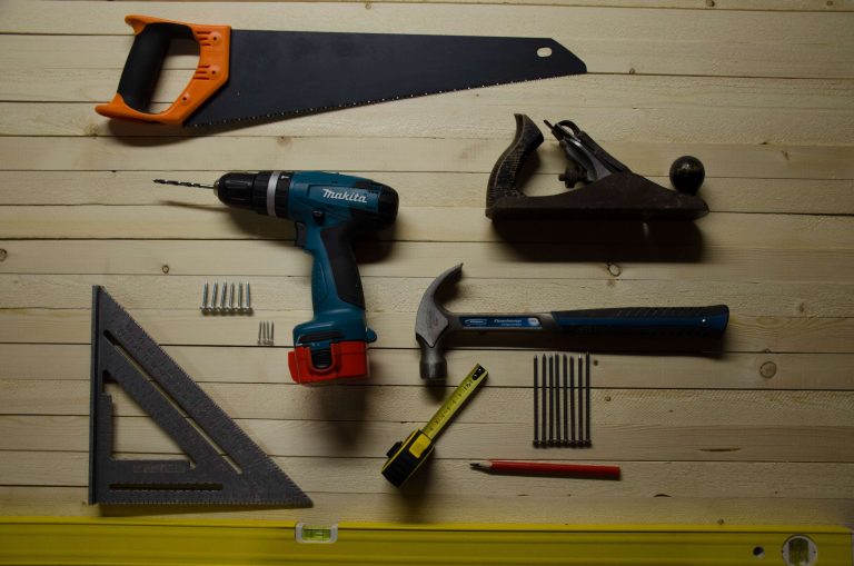A set of builder tools neatly placed on a table