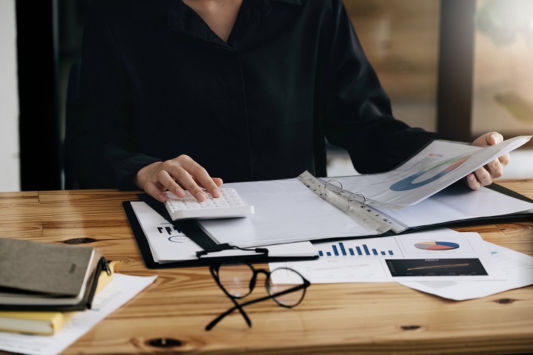 person taking accountancy training at a desk